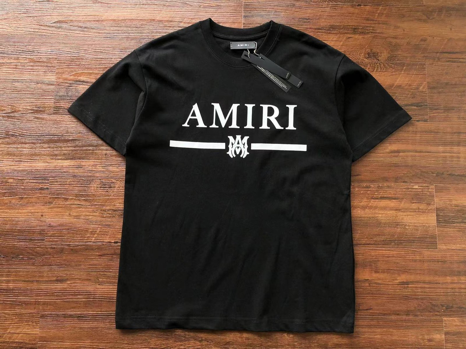 9da13e3b.jpg T-SHIRT - Image 1